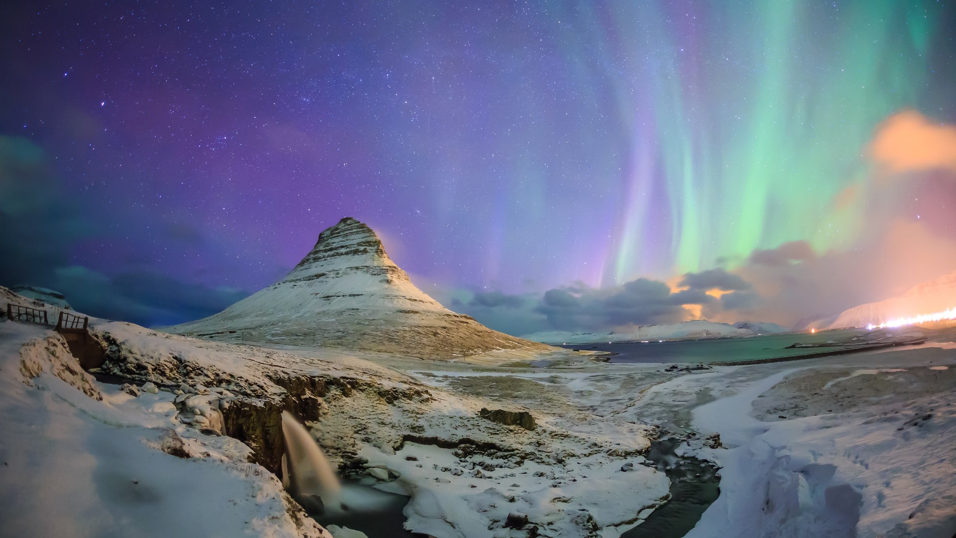 Northern lights appear over mount Kirkjufell Iceland