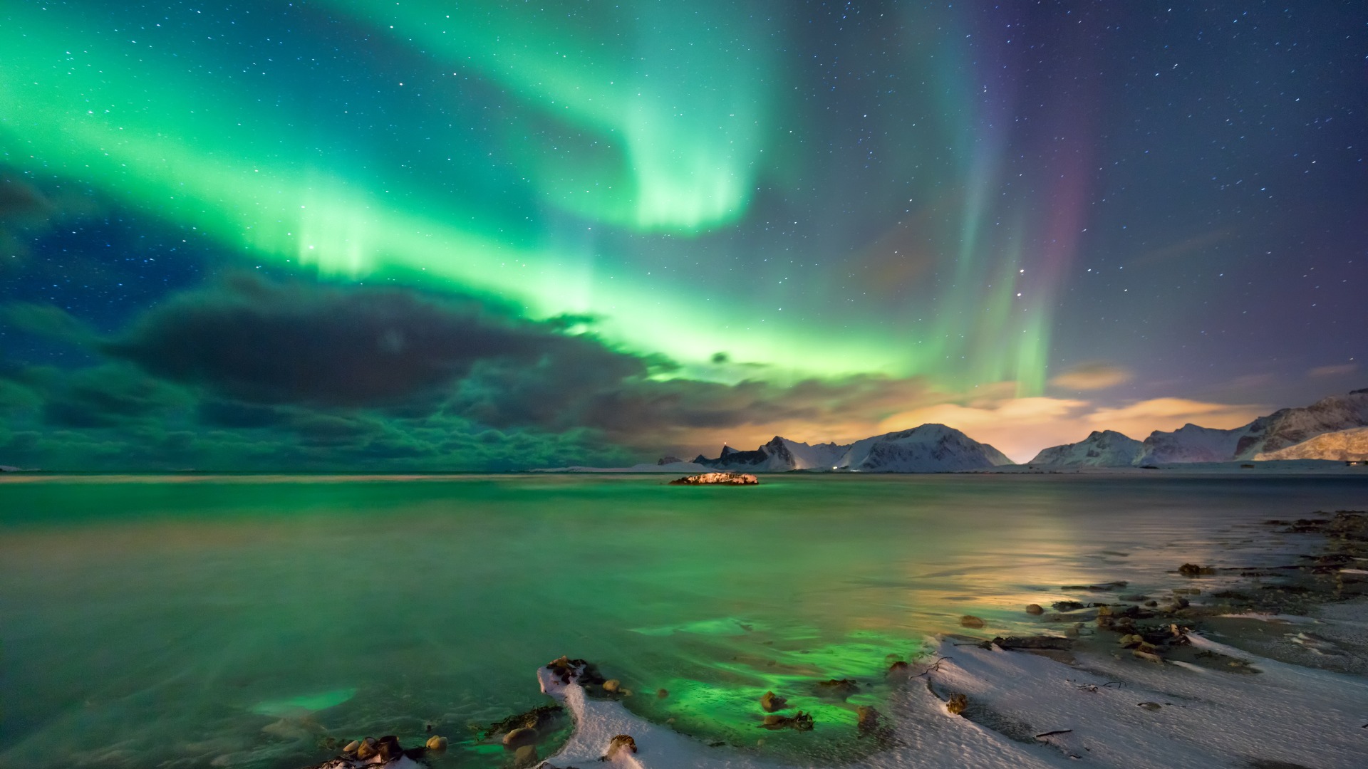 northern lights over norwegian fjord