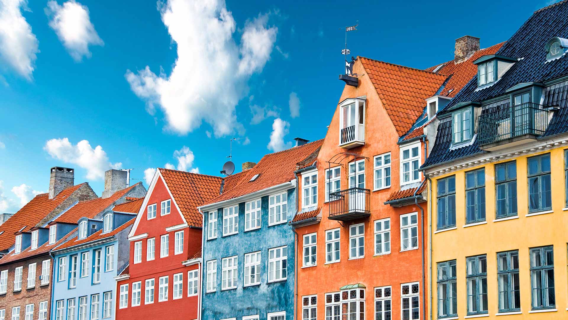 colourful houses and blue skye at Nyhavn in Copenhagen, Denmark