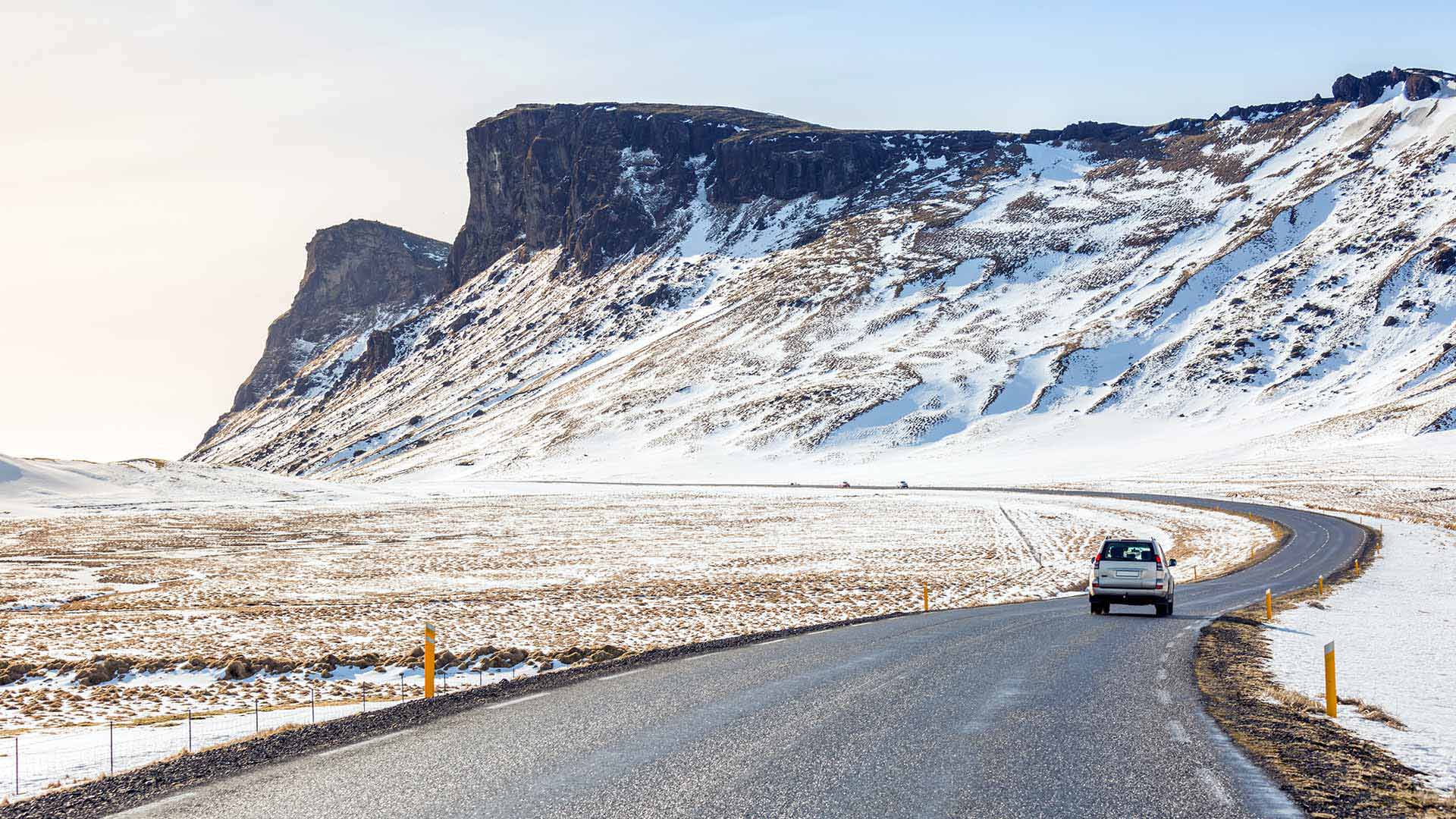 car on ring road in winter