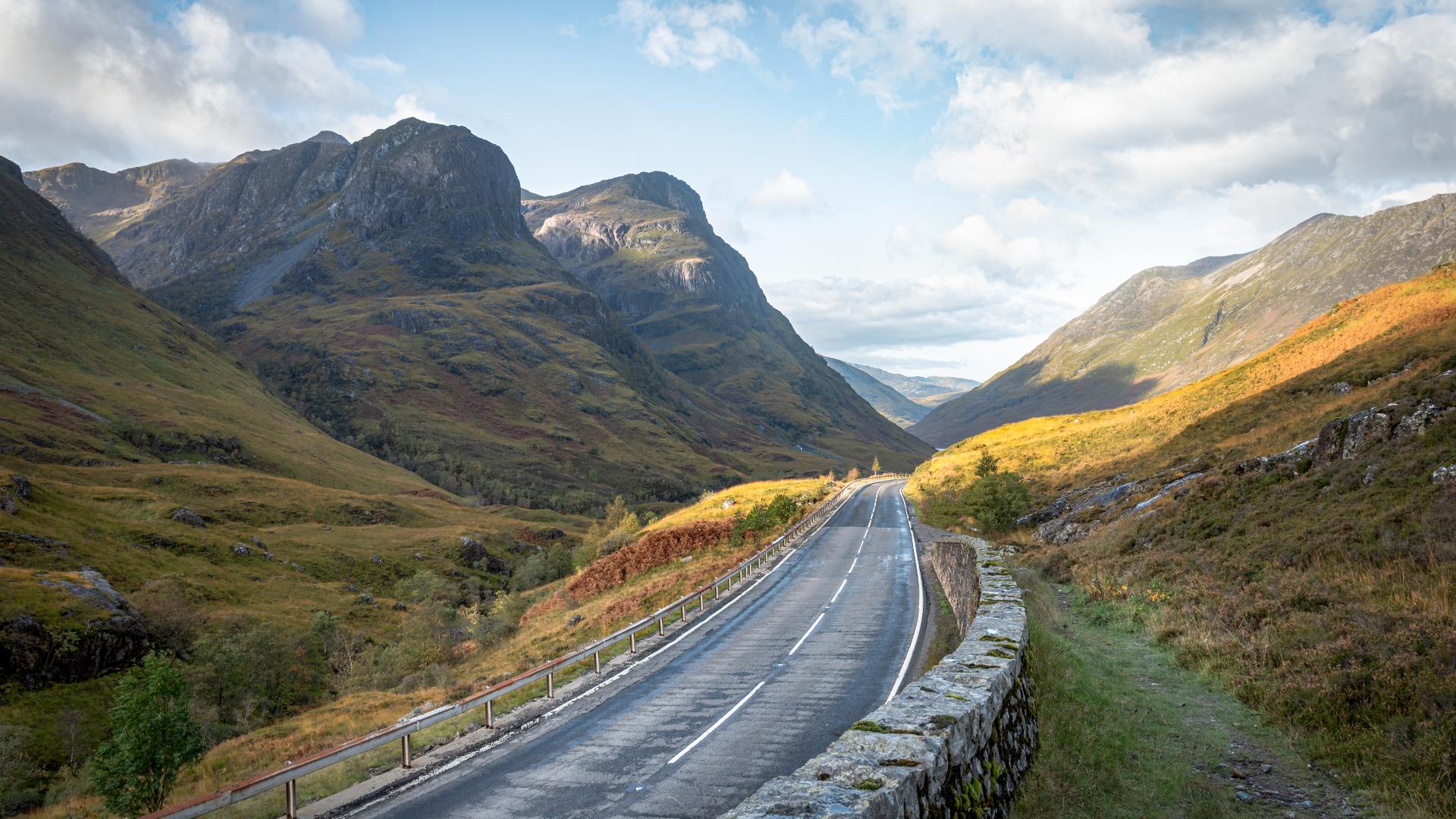 road through glen coe valley in scotland