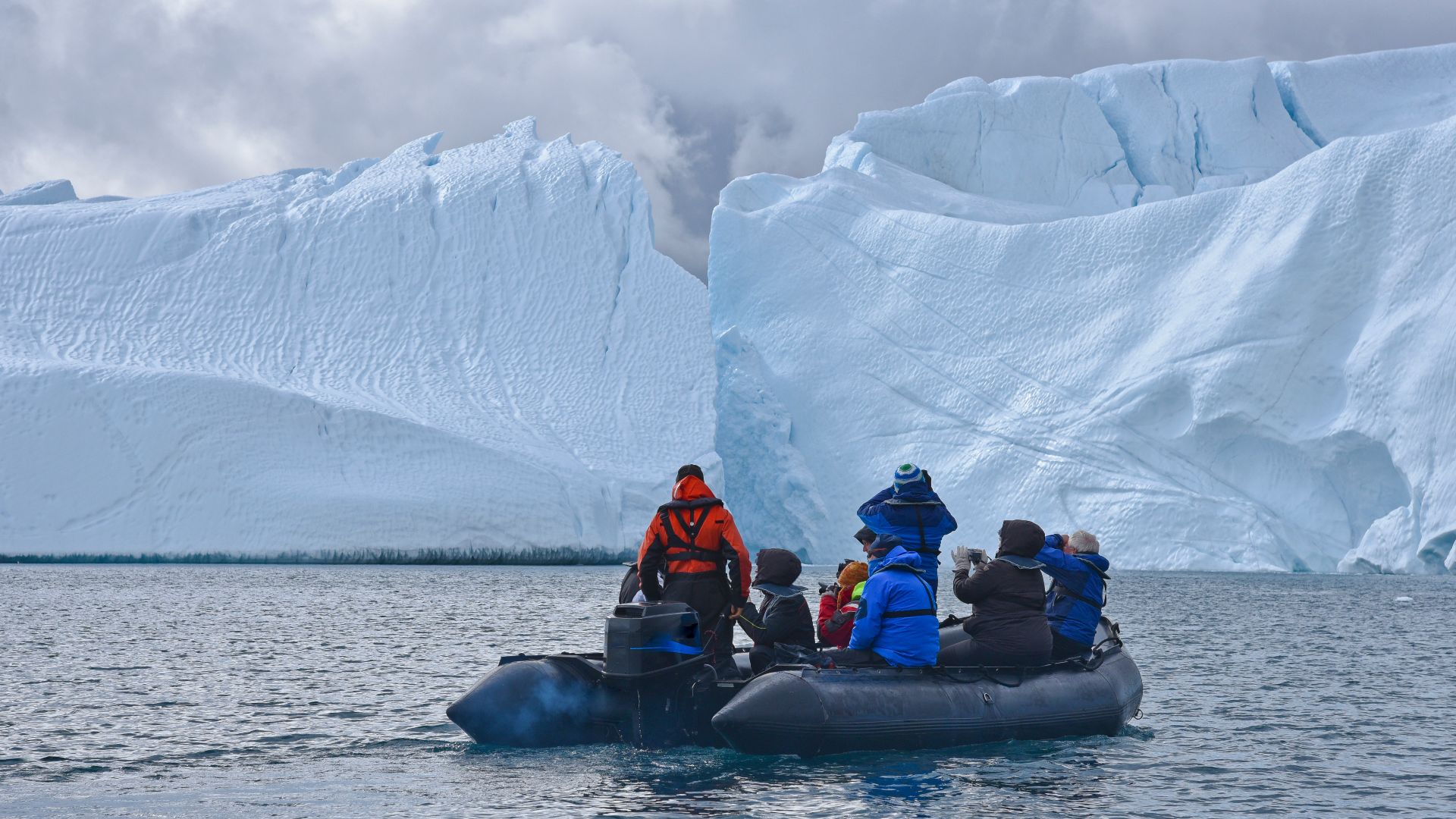 Zodiac boat near a glacier in Svalbard