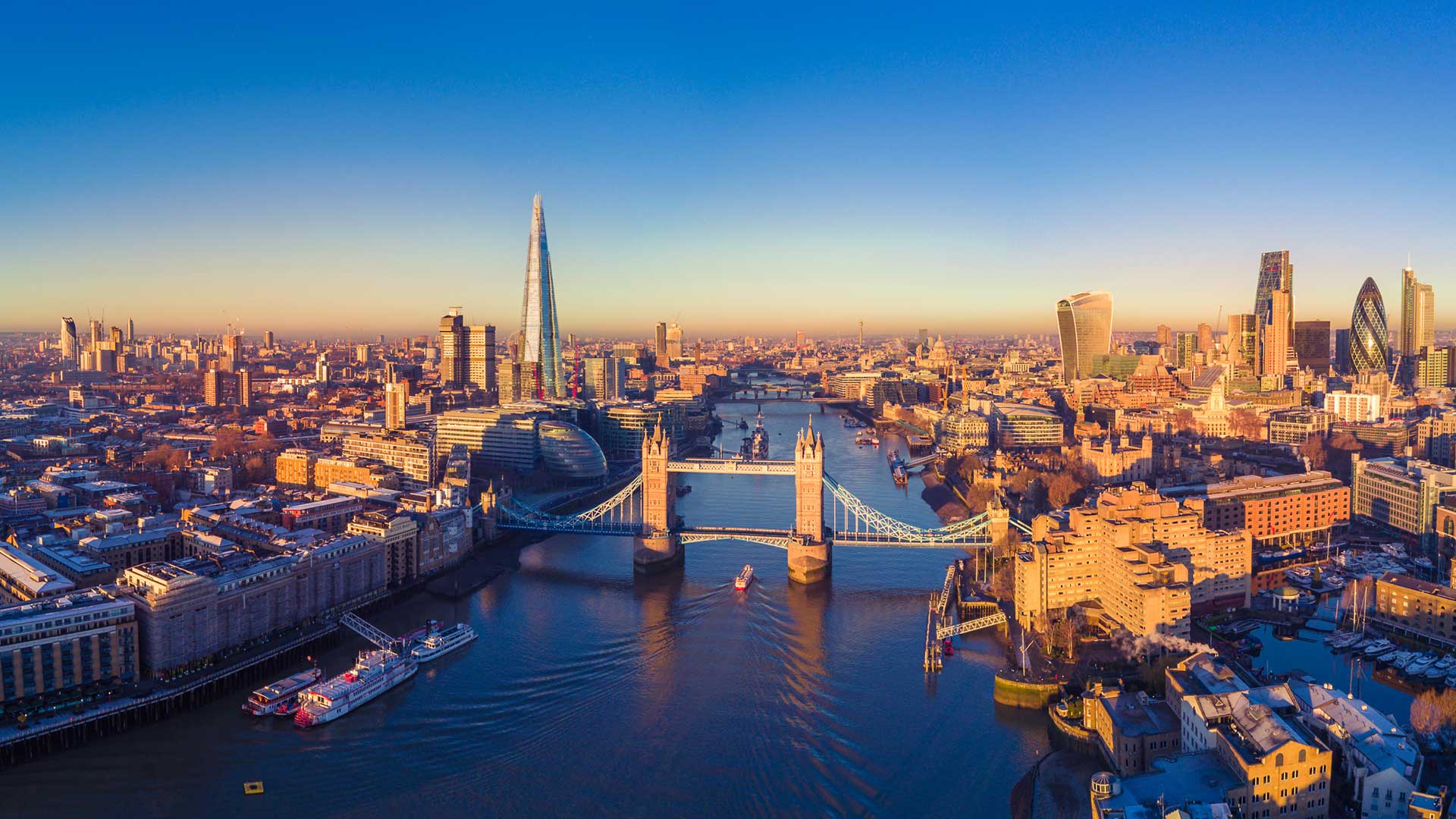 a wide view of London's skyline sunset